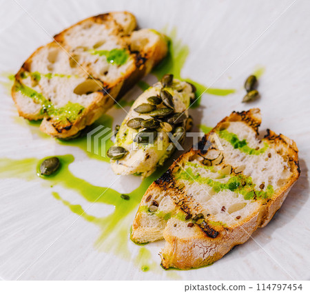 Gourmet toast with avocado and capers 114797454