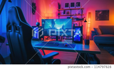 Powerful Personal Computer Gamer Rig with First-Person Shooter Game on Screen. Monitor Stands on the Table at Home. Cozy Room with Modern Design is Lit with Warm and Neon Light Powerful Personal Computer Gamer Rig with First-Person Shooter Game on Screen. Monitor Stands on the Table at Home. Cozy Room with Modern Design is Lit with Warm and Neon Light 114797828