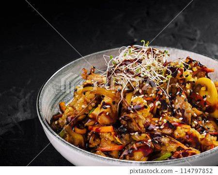 Gourmet stir-fried vegetable dish on elegant plate Gourmet stir-fried vegetable dish on elegant plate 114797852
