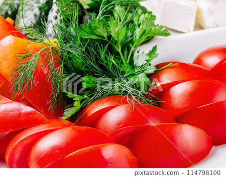 fresh chopped vegetables on a plate fresh chopped vegetables on a plate 114798100