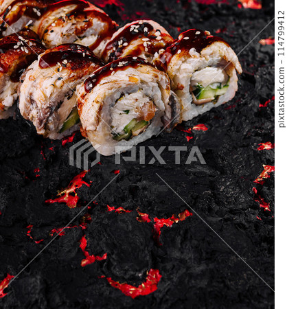 Volcanic sushi concept on lava texture 114799412
