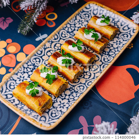 Festive holiday appetizers on ornate serving tray Festive holiday appetizers on ornate serving tray 114800046