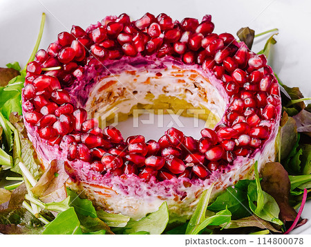 Festive holiday salad with elegant presentation Festive holiday salad with elegant presentation 114800078