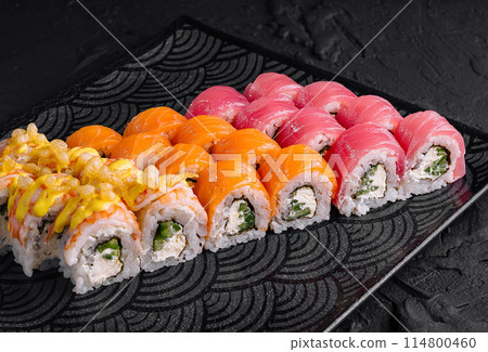 Assorted sushi set on black plate 114800460