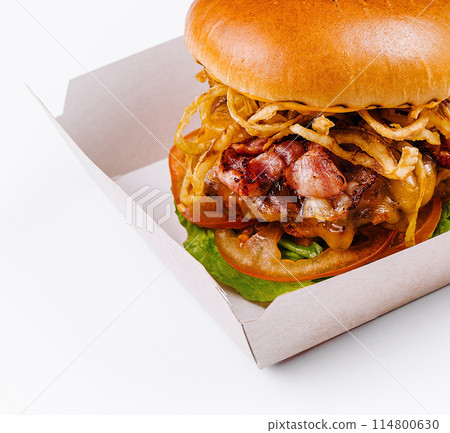 Gourmet burger in takeout box on white background Gourmet burger in takeout box on white background 114800630