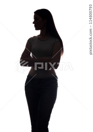 Young woman look ahead - vertical silhouette Young woman look ahead - vertical silhouette 114800793
