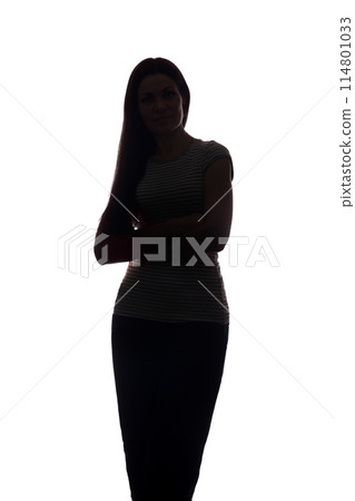 Young woman look ahead with flowing hair - vertical silhouette 114801033