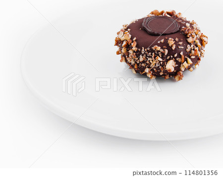 Gourmet chocolate bonbon on white plate Gourmet chocolate bonbon on white plate 114801356