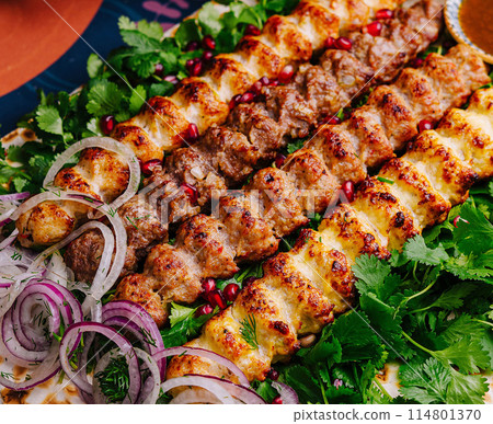 Festive table setting with grilled kebab platter 114801370