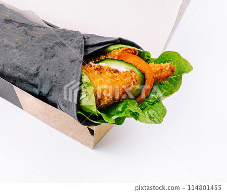 Fresh veggie wrap in takeout box on white background Fresh veggie wrap in takeout box on white background 114801455