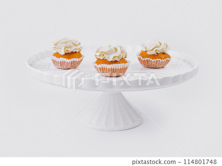 Elegant cupcakes on white stand Elegant cupcakes on white stand 114801748