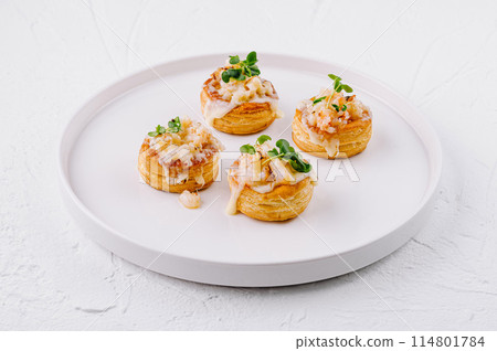 Gourmet shrimp vol-au-vent on elegant plate Gourmet shrimp vol-au-vent on elegant plate 114801784