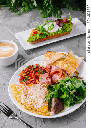 Gourmet breakfast plate with omelette and coffee Gourmet breakfast plate with omelette and coffee 114801785