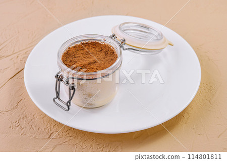 Tiramisu, traditional Italian dessert in a glass 114801811