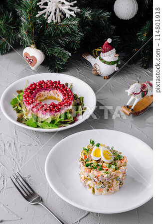 Festive holiday salad and olivier on christmas table 114801918