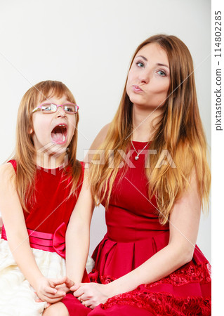 Mommy and daughter having fun Mommy and daughter having fun 114802285