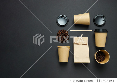 Craft cups for coffee with coffee beans on a black background 114802463