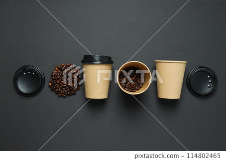 Craft cups for coffee with coffee beans on a black background 114802465