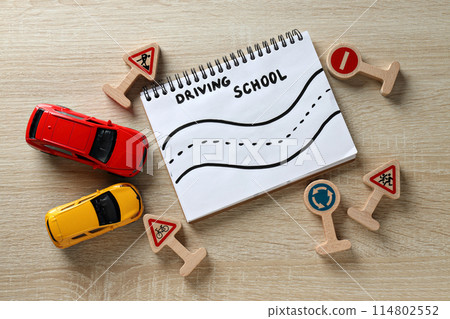 Traffic signs and vehicles on a light background. Traffic signs and vehicles on a light background. 114802552