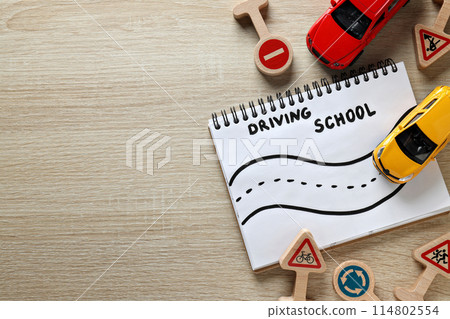 Traffic signs and vehicles on a light background. Traffic signs and vehicles on a light background. 114802554