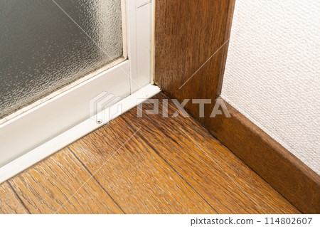 Rainwater seeps in through the sash and floods the flooring (large) Rainwater seeps in through the sash and floods the flooring (large) 114802607