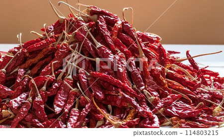 Heaps of dried chillies Heaps of dried chillies 114803215