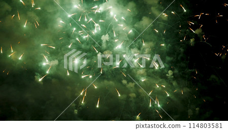 Green firework in night time celebrate national holiday. Green Firework celebrate anniversary happy new year 2024, 4th of july holiday festival. Countdown to new year 2024 festival party background Green firework in night time celebrate national holiday. Green Firework celebrate anniversary happy new year 2024, 4th of july holiday festival. Countdown to new year 2024 festival party background 114803581