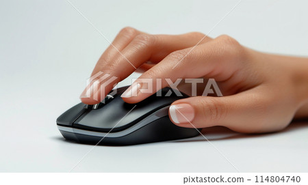 Female hand operating a mouse 114804740