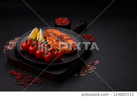 Fresh cooked delicious salmon steak with spices and herbs Fresh cooked delicious salmon steak with spices and herbs 114805131
