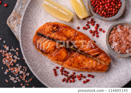 Fresh cooked delicious salmon steak with spices and herbs Fresh cooked delicious salmon steak with spices and herbs 114805145