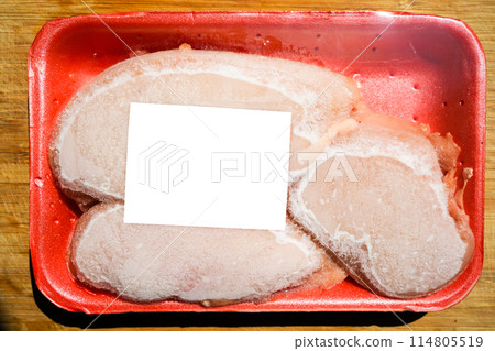Frozen and packaged fresh chicken meat sold in markets and grocery stores Frozen and packaged fresh chicken meat sold in markets and grocery stores 114805519