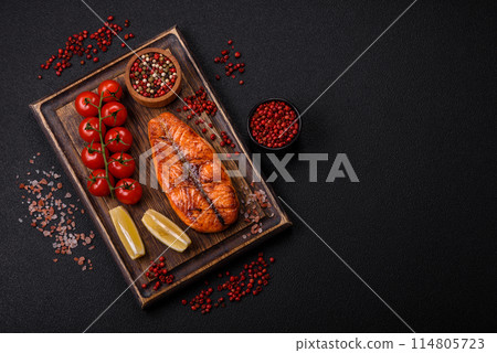 Fresh cooked delicious salmon steak with spices and herbs Fresh cooked delicious salmon steak with spices and herbs 114805723