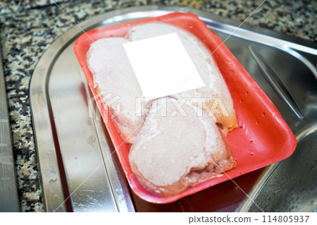 Frozen and packaged fresh chicken meat sold in markets and grocery stores 114805937