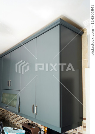 Modern grey wood lacquer paint and gray kitchen cabinet equipment, luxury in a home 114805942