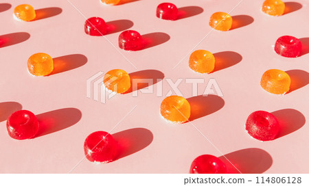 Sweet homemade marmalade on pink. Candy pattern background Sweet homemade marmalade on pink. Candy pattern background 114806128