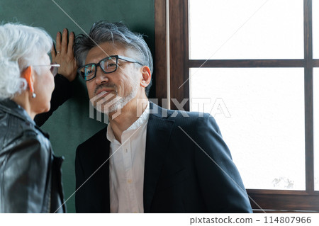 Senior couple to wall don Senior couple to wall don 114807966