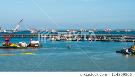 Logistic shipping quay boat Engineering crane depot at logistic export terminal control. Warehouse freight background container yard loading quayside harbor port. Logistics seascape shipping portal Logistic shipping quay boat Engineering crane depot at logistic export terminal control. Warehouse freight background container yard loading quayside harbor port. Logistics seascape shipping portal 114809806