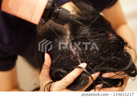 Woman taking a shower / Woman's hands Woman taking a shower / Woman's hands 114811217
