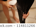 Woman taking a shower 114811266