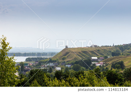 The tower of an ancient Bulgarian fortress on a high cliff on the banks of the Kama River, Elabuga, Tatarstan, Russian Federation The tower of an ancient Bulgarian fortress on a high cliff on the banks of the Kama River, Elabuga, Tatarstan, Russian Federation 114813184