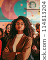 Confident Young Woman Stands Out in a Buzzing Urban Art Gallery Event 114813204