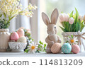 Serene Spring Celebration With Pastel Easter Eggs and Bunny Figurine 114813209