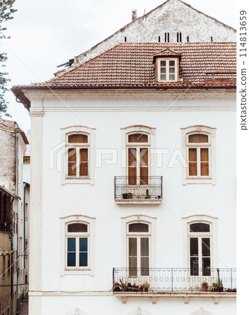 Classic white facade of urban house 114813659