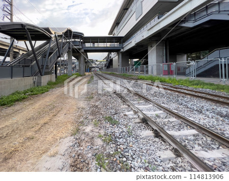 The old railroad tracks pass over the overpass. 114813906