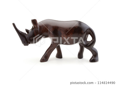 Wooden figurine of a rhinoceros isolated. Wooden figurine of a rhinoceros isolated. 114814490