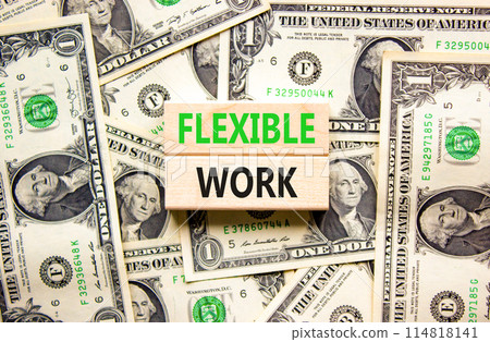 Flexible work symbol. Concept words Flexible work on beautiful wooden block. Beautiful dollar bills background. Dollar bills. Business Flexible work concept. Copy space. 114818141