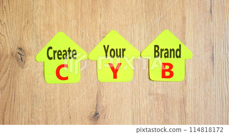 CYB Create your brand symbol. Concept words CYB Create your brand on beautiful yellow paper. Beautiful wooden background. Business CYB Create your brand concept. Copy space. 114818172