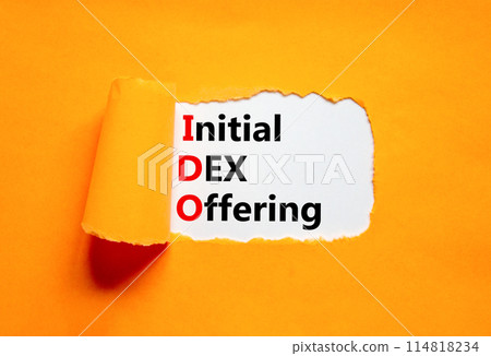 IDO initial DEX offering symbol. Concept words IDO initial DEX offering on beautiful white paper. Beautiful orange paper background. Business IDO initial DEX offering concept. Copy space. 114818234