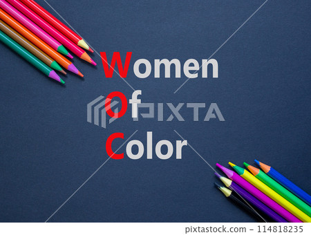 WOC women of color symbol. Concept words WOC women of color on beautiful black paper. Beautiful black background. Colored pencils. Business WOC women of color social issues concept. Copy space. 114818235