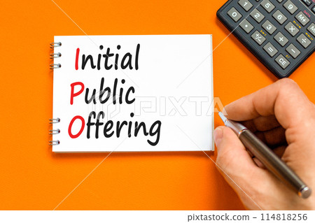 IPO initial public offering symbol. Concept words IPO initial public offering on beautiful white note. Beautiful orange background. Business IPO initial public offering concept. Copy space. 114818256